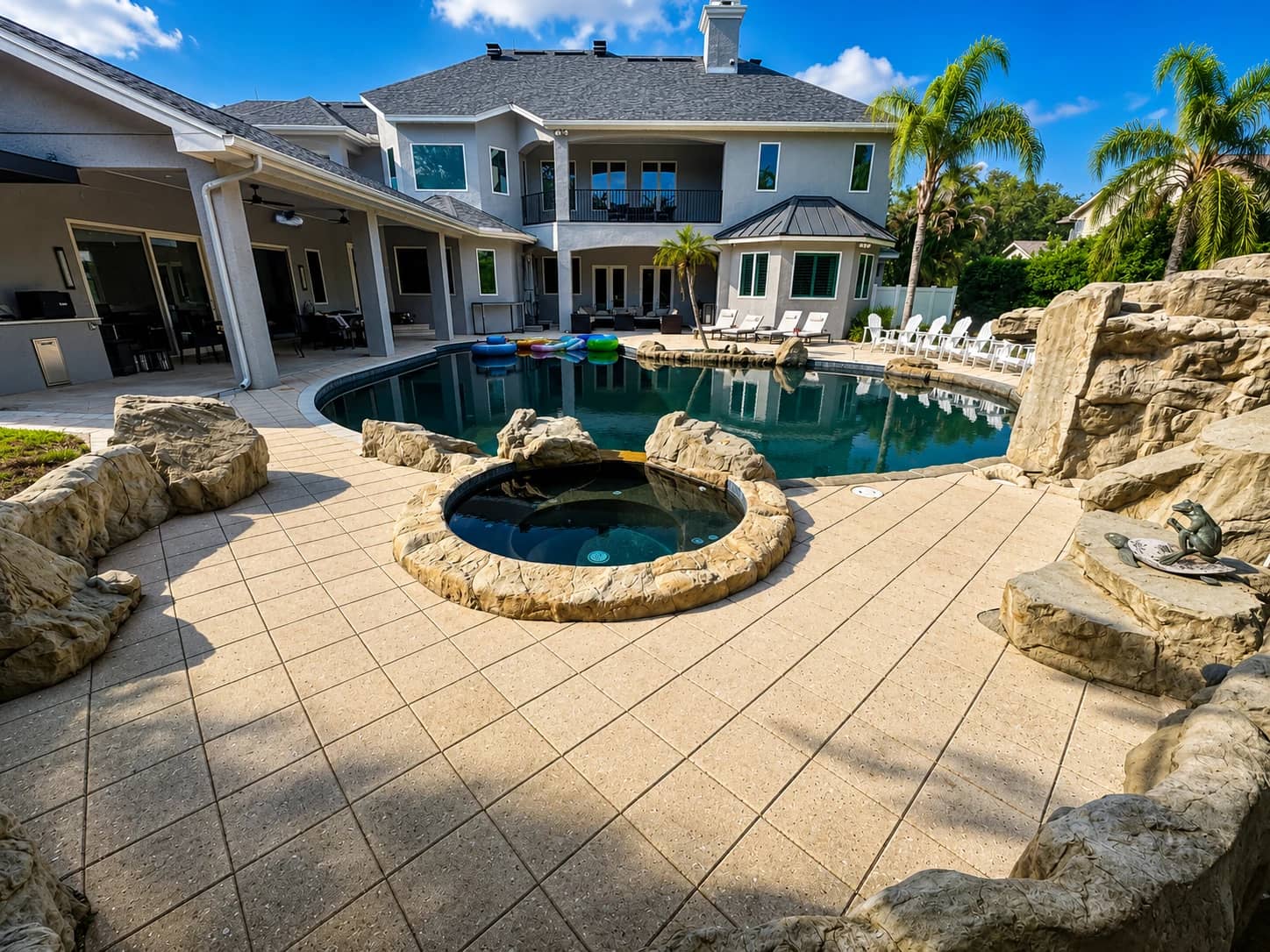 Repaired and sealed pavers around a backyard pool at a Pinellas County home.